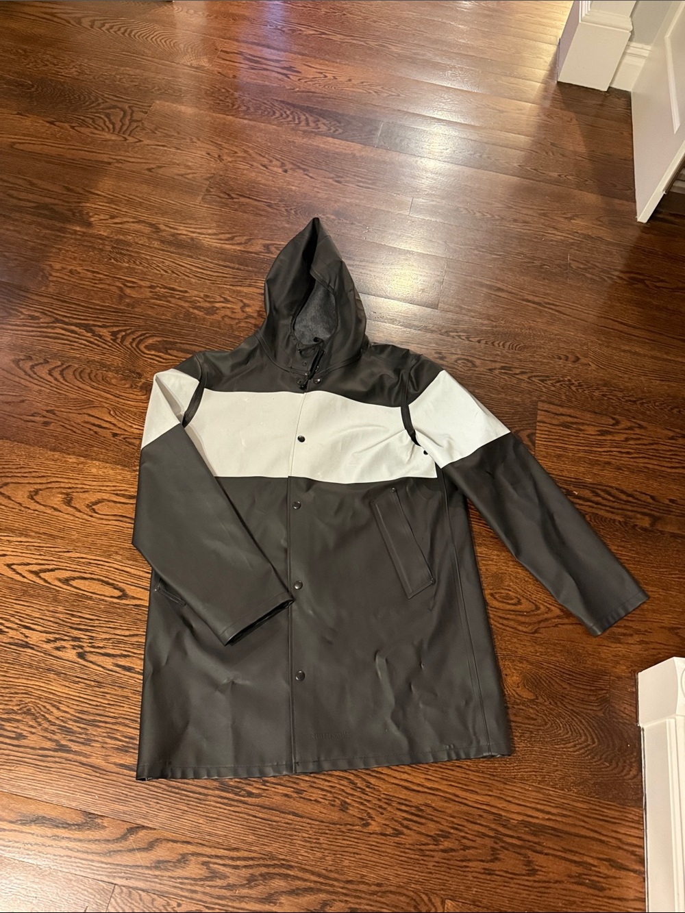 Stutterheim Black Raincoat with Light Gray Chest Panel